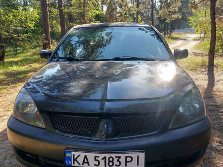 Мицубиси Лансер 2007 в Украинке на Automoto.ua Черный Мицубиси Лансер, объемом двигателя 2 л и пробегом 290 тыс. км за 3300 $, фото 1 на Automoto.ua