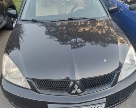 Чорний Міцубісі Lancer, об'ємом двигуна 1.6 л та пробігом 2 тис. км за 7751 $, фото 1 на Automoto.ua
