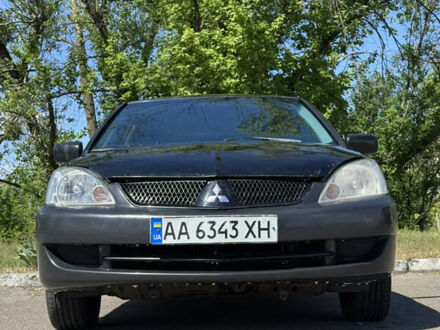 Мицубиси Лансер 2007 в Киеве на Automoto.ua Черный Мицубиси Лансер, объемом двигателя 1.58 л и пробегом 380 тыс. км за 3900 $, фото 1 на Automoto.ua