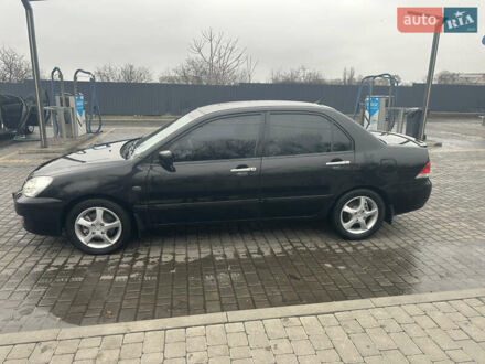Чорний Міцубісі Lancer, об'ємом двигуна 1.6 л та пробігом 270 тис. км за 4500 $, фото 1 на Automoto.ua