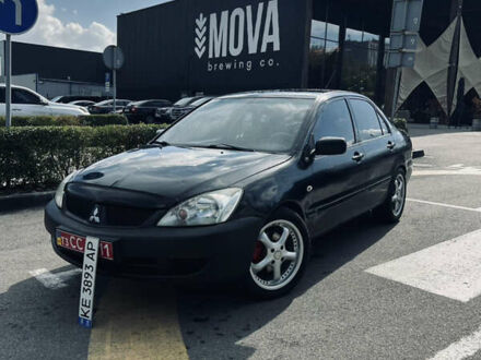 Міцубісі Lancer 2007 у Дніпро (Дніпропетровську) на Automoto.ua Чорний Міцубісі Lancer, об'ємом двигуна 1.58 л та пробігом 228 тис. км за 3850 $, фото 1 на Automoto.ua