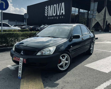 Чорний Міцубісі Lancer, об'ємом двигуна 1.58 л та пробігом 228 тис. км за 3850 $, фото 1 на Automoto.ua