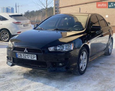 Черный Мицубиси Лансер, объемом двигателя 2 л и пробегом 283 тыс. км за 6100 $, фото 1 на Automoto.ua
