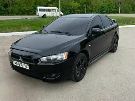 Чорний Міцубісі Lancer, об'ємом двигуна 2 л та пробігом 186 тис. км за 4600 $, фото 1 на Automoto.ua