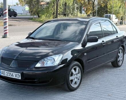 Чорний Міцубісі Lancer, об'ємом двигуна 1.58 л та пробігом 255 тис. км за 3600 $, фото 1 на Automoto.ua