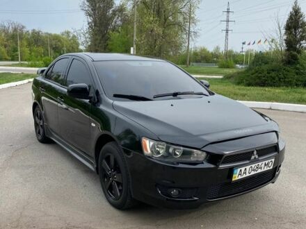 Чорний Міцубісі Lancer, об'ємом двигуна 2 л та пробігом 178 тис. км за 7000 $, фото 1 на Automoto.ua