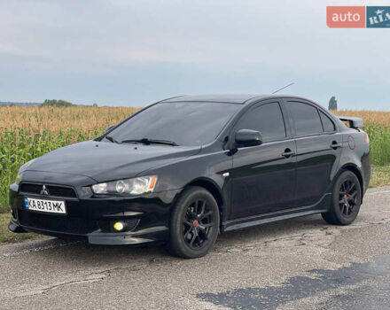 Чорний Міцубісі Lancer, об'ємом двигуна 2 л та пробігом 183 тис. км за 7800 $, фото 1 на Automoto.ua