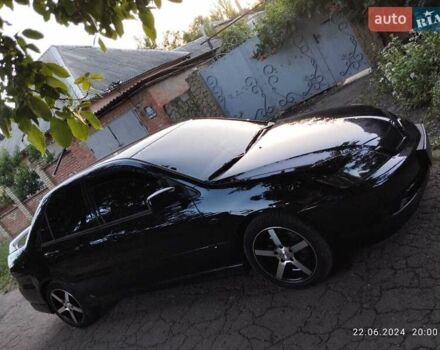 Чорний Міцубісі Lancer, об'ємом двигуна 2 л та пробігом 193 тис. км за 6250 $, фото 1 на Automoto.ua