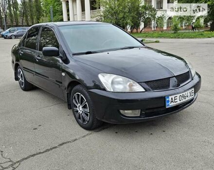 Чорний Міцубісі Lancer, об'ємом двигуна 1.58 л та пробігом 214 тис. км за 3700 $, фото 1 на Automoto.ua