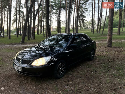 Мицубиси Лансер 2007 в Сумах на Automoto.ua Черный Мицубиси Лансер, объемом двигателя 1.58 л и пробегом 224 тыс. км за 3900 $, фото 1 на Automoto.ua