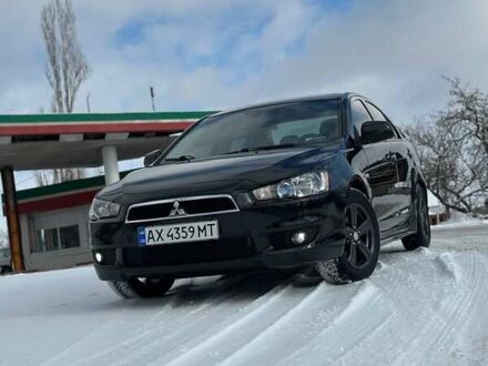 Міцубісі Lancer 2007 у Изюме на Automoto.ua Чорний Міцубісі Lancer, об'ємом двигуна 2 л та пробігом 287 тис. км за 7150 $, фото 1 на Automoto.ua