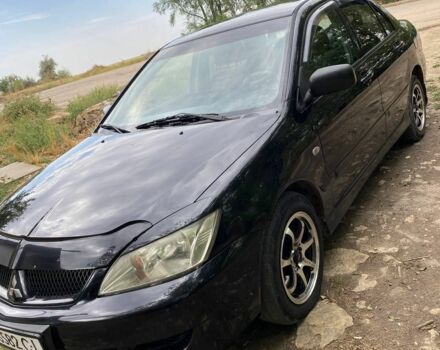 Чорний Міцубісі Lancer, об'ємом двигуна 1.6 л та пробігом 232 тис. км за 4400 $, фото 1 на Automoto.ua