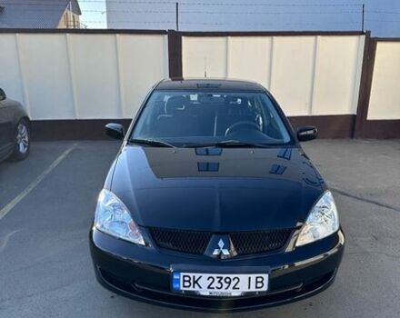 Черный Мицубиси Лансер, объемом двигателя 1.58 л и пробегом 194 тыс. км за 4950 $, фото 1 на Automoto.ua
