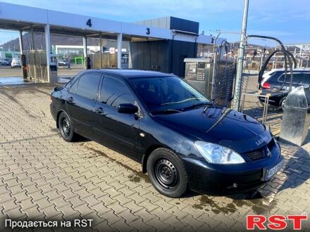 Міцубісі Lancer 2007 у Закарпаття на Automoto.ua Чорний Міцубісі Lancer, об'ємом двигуна 1.6 л та пробігом 230 тис. км за 4500 $, фото 1 на Automoto.ua
