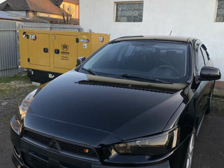 Черный Мицубиси Лансер, объемом двигателя 2 л и пробегом 164 тыс. км за 8300 $, фото 1 на Automoto.ua