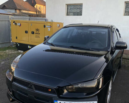 Черный Мицубиси Лансер, объемом двигателя 2 л и пробегом 164 тыс. км за 8300 $, фото 1 на Automoto.ua