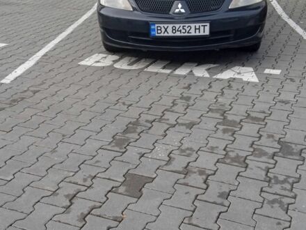 Черный Мицубиси Лансер, объемом двигателя 1.6 л и пробегом 223 тыс. км за 4300 $, фото 1 на Automoto.ua