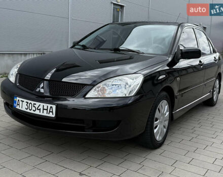 Чорний Міцубісі Lancer, об'ємом двигуна 1.6 л та пробігом 256 тис. км за 3950 $, фото 1 на Automoto.ua