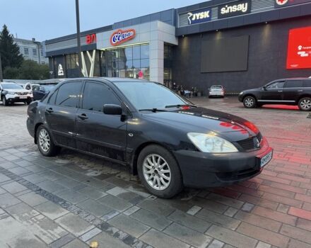 Чорний Міцубісі Lancer, об'ємом двигуна 1.6 л та пробігом 280 тис. км за 2450 $, фото 1 на Automoto.ua