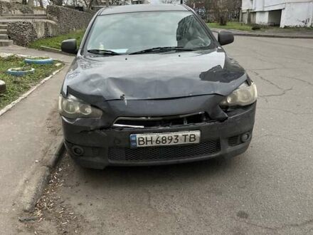 Черный Мицубиси Лансер, объемом двигателя 2 л и пробегом 220 тыс. км за 5500 $, фото 1 на Automoto.ua