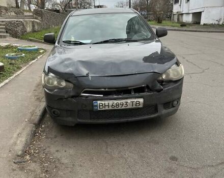 Черный Мицубиси Лансер, объемом двигателя 2 л и пробегом 220 тыс. км за 5500 $, фото 1 на Automoto.ua