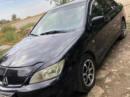 Міцубісі Lancer 2007 у Миколаєві на Automoto.ua Чорний Міцубісі Lancer, об'ємом двигуна 1.58 л та пробігом 231 тис. км за 4300 $, фото 1 на Automoto.ua