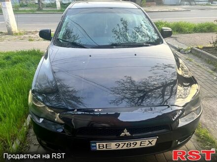 Чорний Міцубісі Lancer, об'ємом двигуна 2 л та пробігом 193 тис. км за 7000 $, фото 1 на Automoto.ua