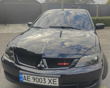 Міцубісі Lancer 2007 у Кам'янське (Дніпродзержинськ) на Automoto.ua Чорний Міцубісі Lancer, об'ємом двигуна 2 л та пробігом 268 тис. км за 5999 $, фото 1 на Automoto.ua