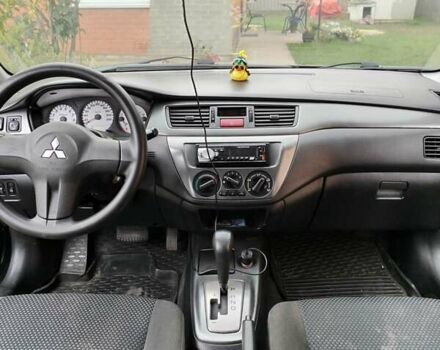 Чорний Міцубісі Lancer, об'ємом двигуна 1.58 л та пробігом 230 тис. км за 4700 $, фото 1 на Automoto.ua
