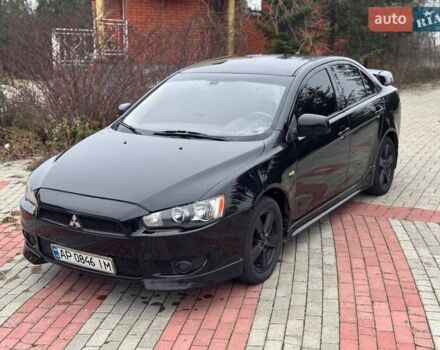 Черный Мицубиси Лансер, объемом двигателя 2 л и пробегом 217 тыс. км за 5500 $, фото 1 на Automoto.ua