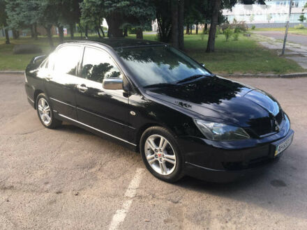 Чорний Міцубісі Lancer, об'ємом двигуна 2 л та пробігом 192 тис. км за 5250 $, фото 1 на Automoto.ua