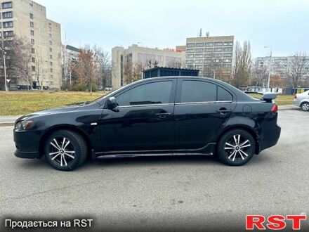 Чорний Міцубісі Lancer, об'ємом двигуна 2 л та пробігом 293 тис. км за 6099 $, фото 1 на Automoto.ua