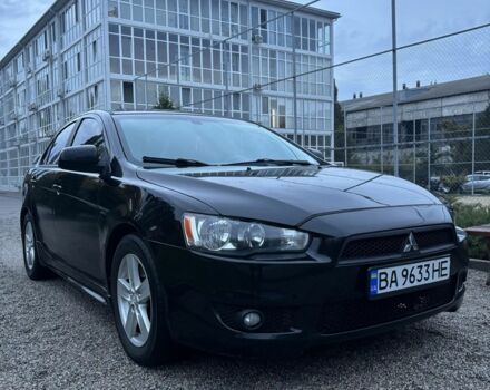 Чорний Міцубісі Lancer, об'ємом двигуна 2 л та пробігом 300 тис. км за 6185 $, фото 1 на Automoto.ua
