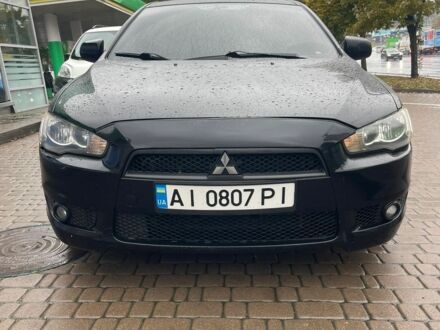 Мицубиси Лансер 2007 в Василькове на Automoto.ua Черный Мицубиси Лансер, объемом двигателя 2 л и пробегом 277 тыс. км за 4700 $, фото 1 на Automoto.ua