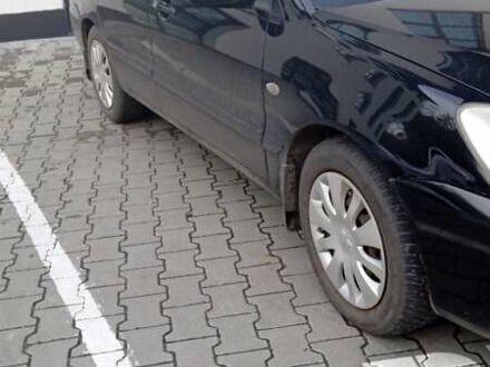 Черный Мицубиси Лансер, объемом двигателя 1.6 л и пробегом 223 тыс. км за 4300 $, фото 1 на Automoto.ua