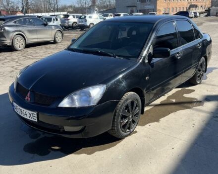 Черный Мицубиси Лансер, объемом двигателя 1.6 л и пробегом 260 тыс. км за 4250 $, фото 1 на Automoto.ua