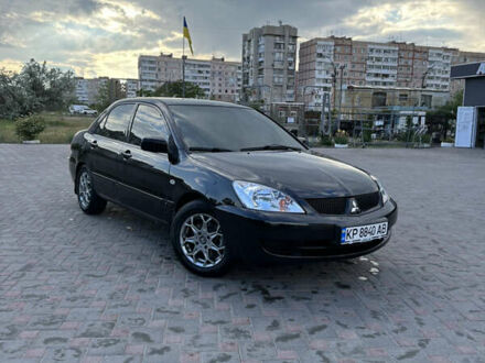 Мицубиси Лансер 2007 в Запорожье на Automoto.ua Черный Мицубиси Лансер, объемом двигателя 1.6 л и пробегом 189 тыс. км за 4750 $, фото 1 на Automoto.ua