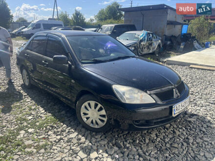 Мицубиси Лансер 2007 в Ужгороде на Automoto.ua Черный Мицубиси Лансер, объемом двигателя 1.58 л и пробегом 240 тыс. км за 3000 $, фото 1 на Automoto.ua