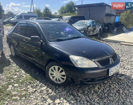 Чорний Міцубісі Lancer, об'ємом двигуна 1.58 л та пробігом 240 тис. км за 3000 $, фото 1 на Automoto.ua
