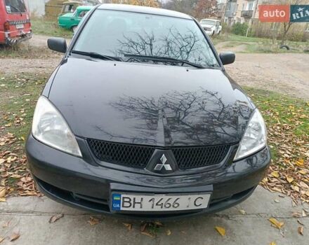 Чорний Міцубісі Lancer, об'ємом двигуна 1.58 л та пробігом 227 тис. км за 4100 $, фото 1 на Automoto.ua