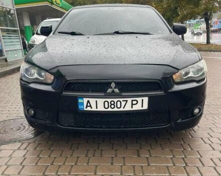 Чорний Міцубісі Lancer, об'ємом двигуна 2 л та пробігом 277 тис. км за 4650 $, фото 1 на Automoto.ua