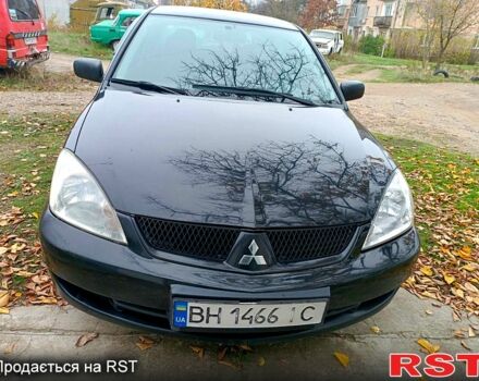 Чорний Міцубісі Lancer, об'ємом двигуна 1.6 л та пробігом 227 тис. км за 4100 $, фото 1 на Automoto.ua