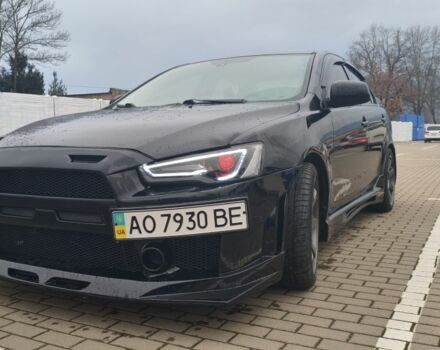 Чорний Міцубісі Lancer, об'ємом двигуна 2 л та пробігом 160 тис. км за 8000 $, фото 1 на Automoto.ua