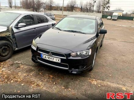 Мицубиси Лансер 2007 в Черкассах на Automoto.ua Черный Мицубиси Лансер, объемом двигателя 2 л и пробегом 247 тыс. км за 8000 $, фото 1 на Automoto.ua