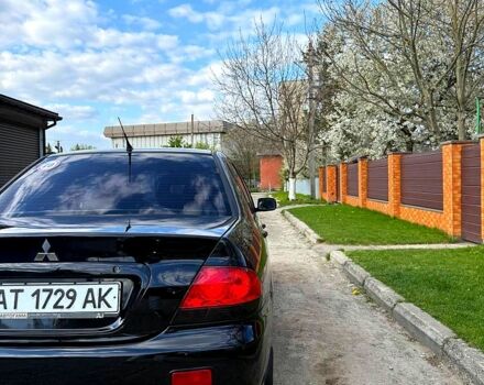Черный Мицубиси Лансер, объемом двигателя 1.6 л и пробегом 169 тыс. км за 4900 $, фото 1 на Automoto.ua