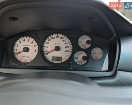 Черный Мицубиси Лансер, объемом двигателя 1.6 л и пробегом 215 тыс. км за 3000 $, фото 1 на Automoto.ua