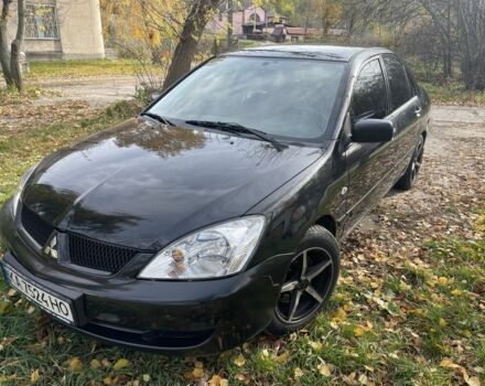 Міцубісі Lancer 2007 у Каневе на Automoto.ua Чорний Міцубісі Lancer, об'ємом двигуна 1.6 л та пробігом 310 тис. км за 4100 $, фото 1 на Automoto.ua