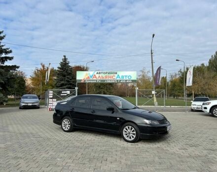 Мицубиси Лансер 2007 в Кривом Роге на Automoto.ua Черный Мицубиси Лансер, объемом двигателя 2 л и пробегом 143 тыс. км за 5400 $, фото 1 на Automoto.ua