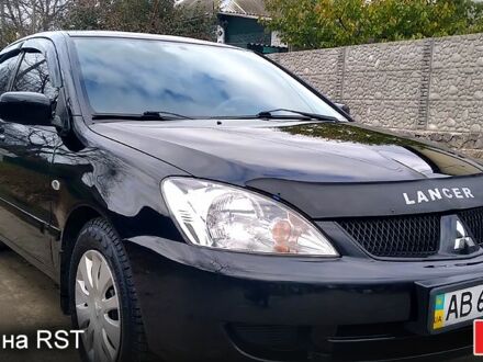 Чорний Міцубісі Lancer, об'ємом двигуна 1.6 л та пробігом 170 тис. км за 5100 $, фото 1 на Automoto.ua