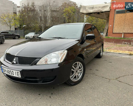 Чорний Міцубісі Lancer, об'ємом двигуна 1.58 л та пробігом 173 тис. км за 4700 $, фото 1 на Automoto.ua